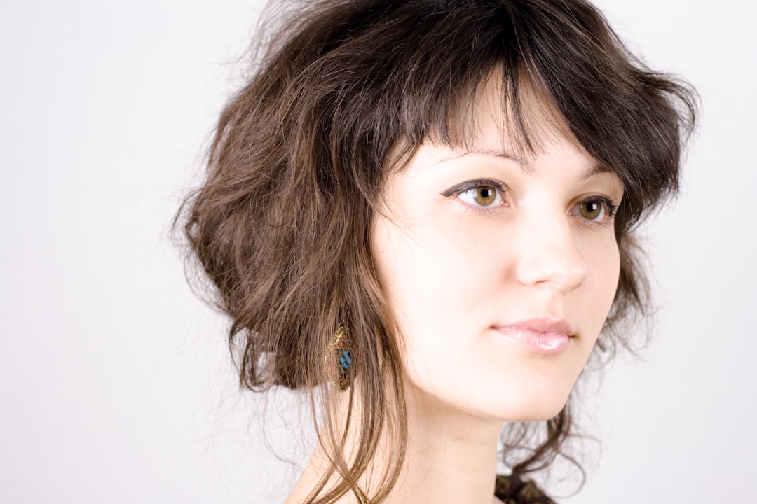 A close up of a person wearing a necklace