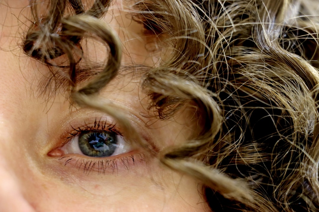a close up of a woman's eye