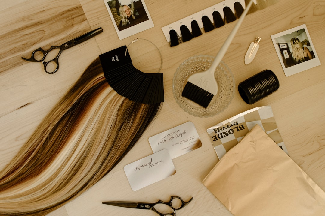 A table topped with a pair of scissors and a pair of scissors