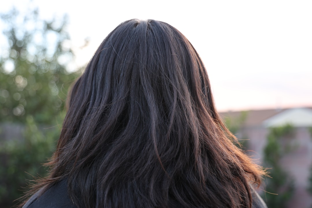a close up of a person with long hair