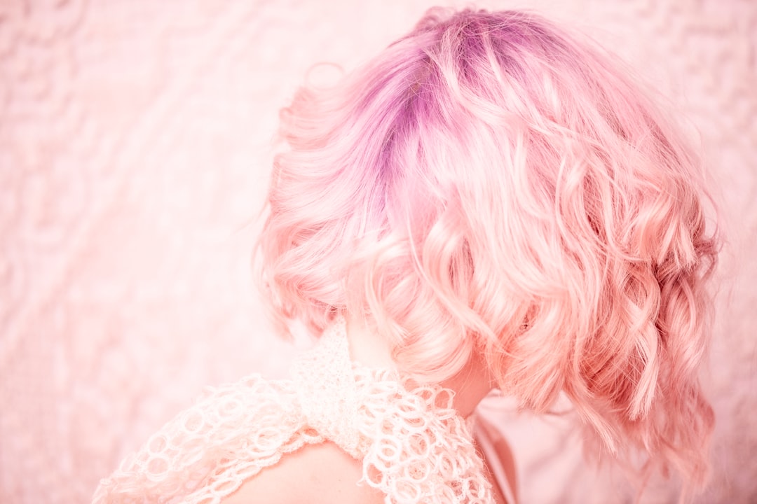 Woman with pink and purple wavy hair