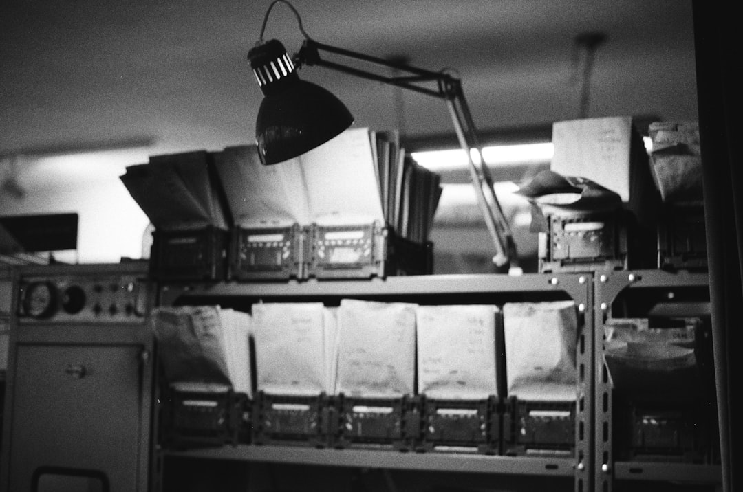 a black and white photo of a kitchen