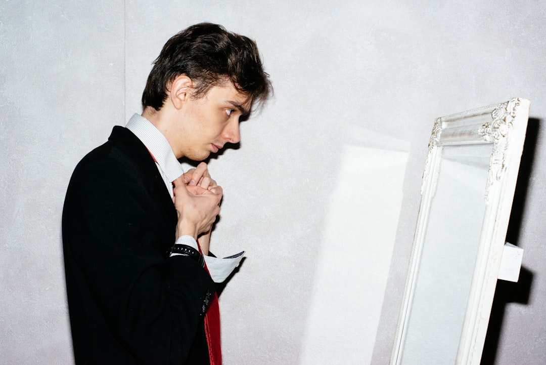 man in black suit jacket