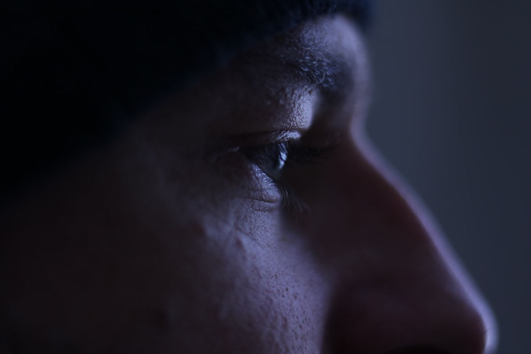 Close-up profile of a man's eye.