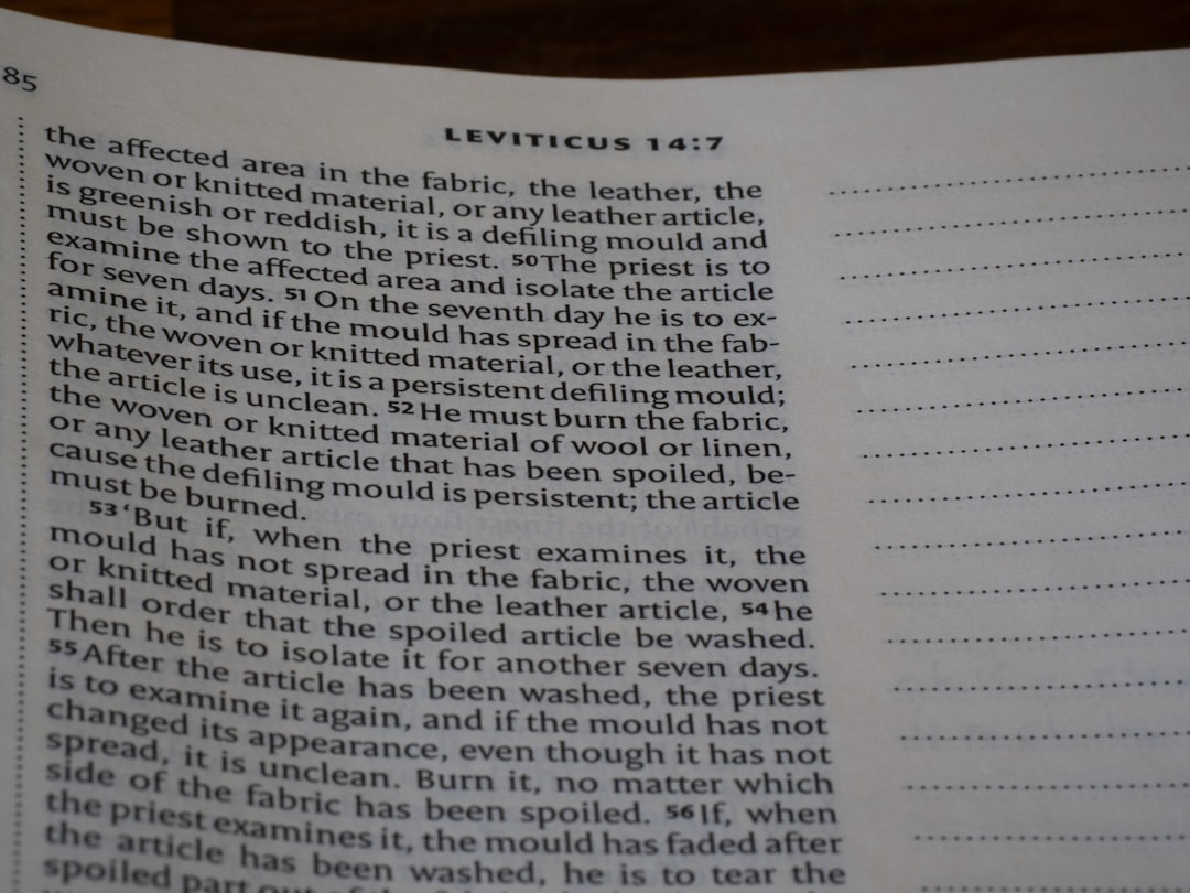 Bible text from leviticus 14:7 on a page.